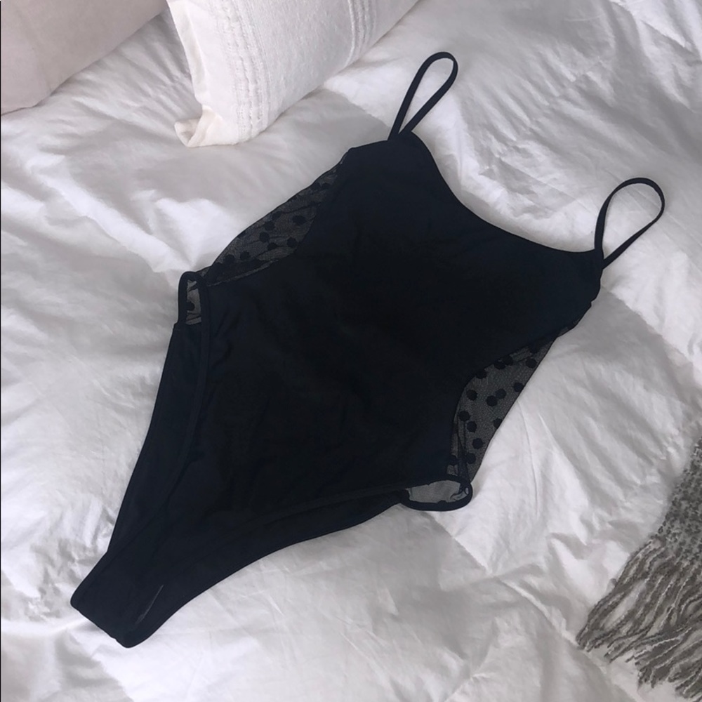 Brand new never worn black one piece/ White fox